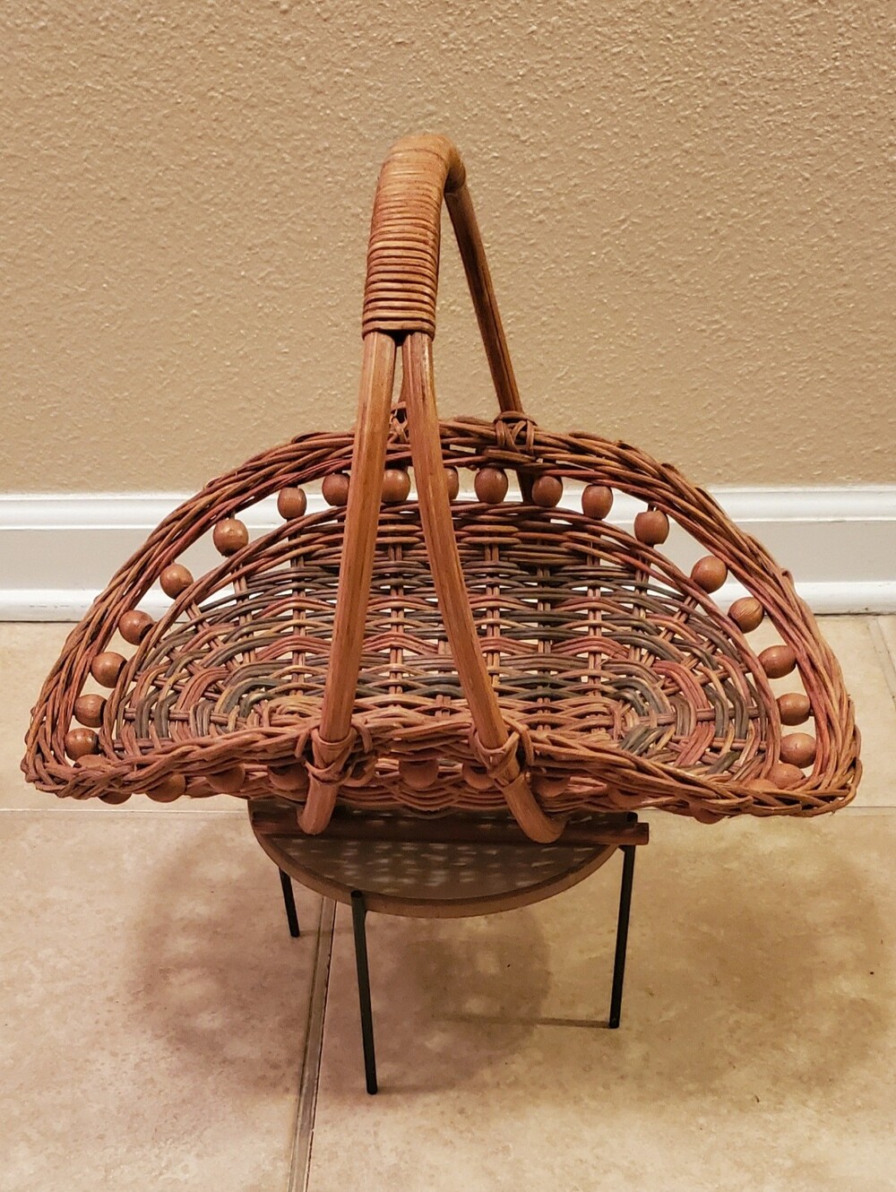 VTG. Handwoven Rattan Gathering Basket with Wood Bead Trim & Arched Handle.